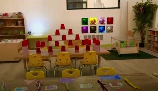 Stacked cup pyramid and a grid of colored squares in the STEM classroom